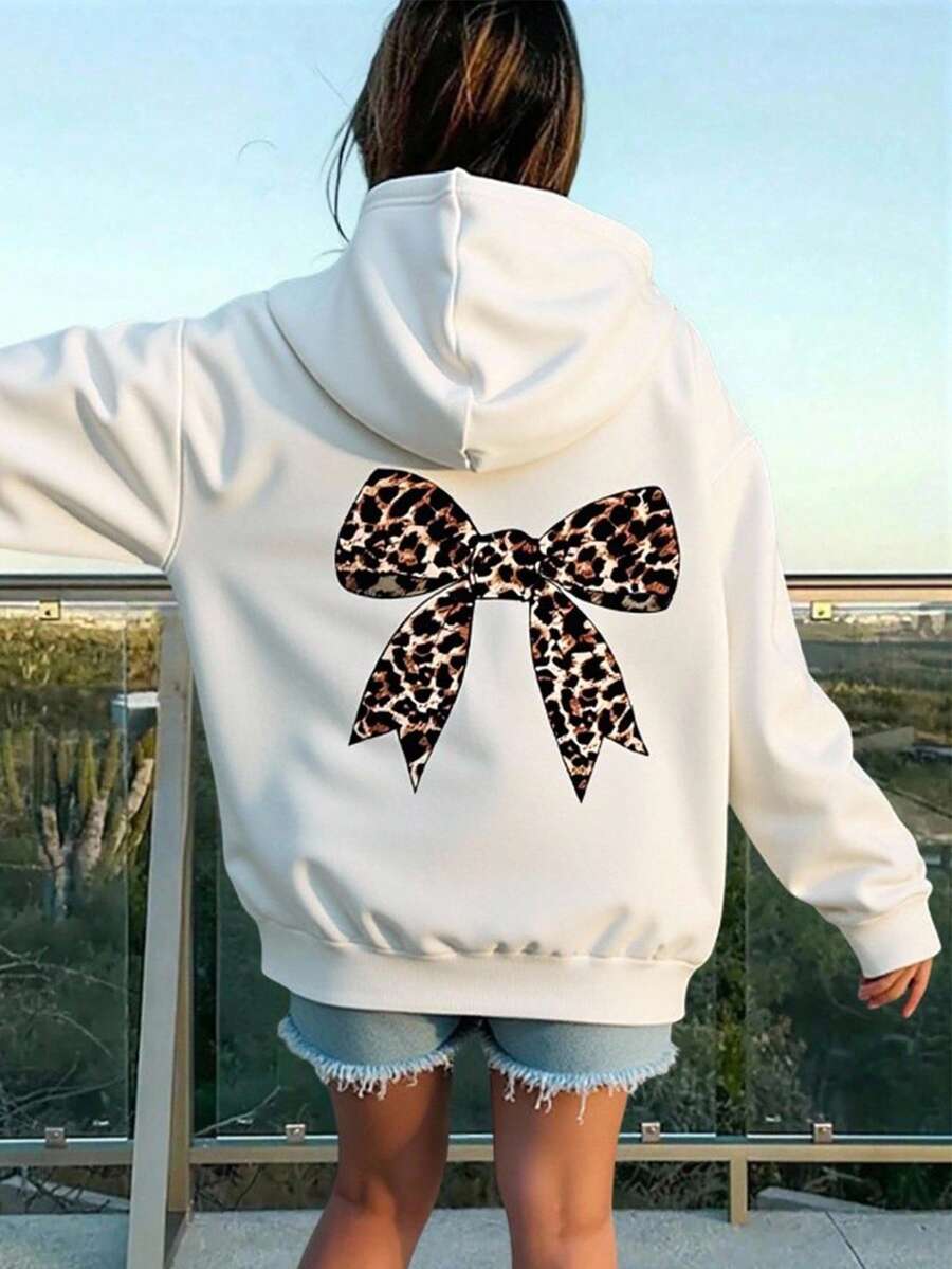 SHEIN Sudadera holgada con forro térmico, con acento de lazo con estampado de leopardo y diseño gráfico en la espalda, para adolescentes, otoño/invierno - Blanco - Ver 1
