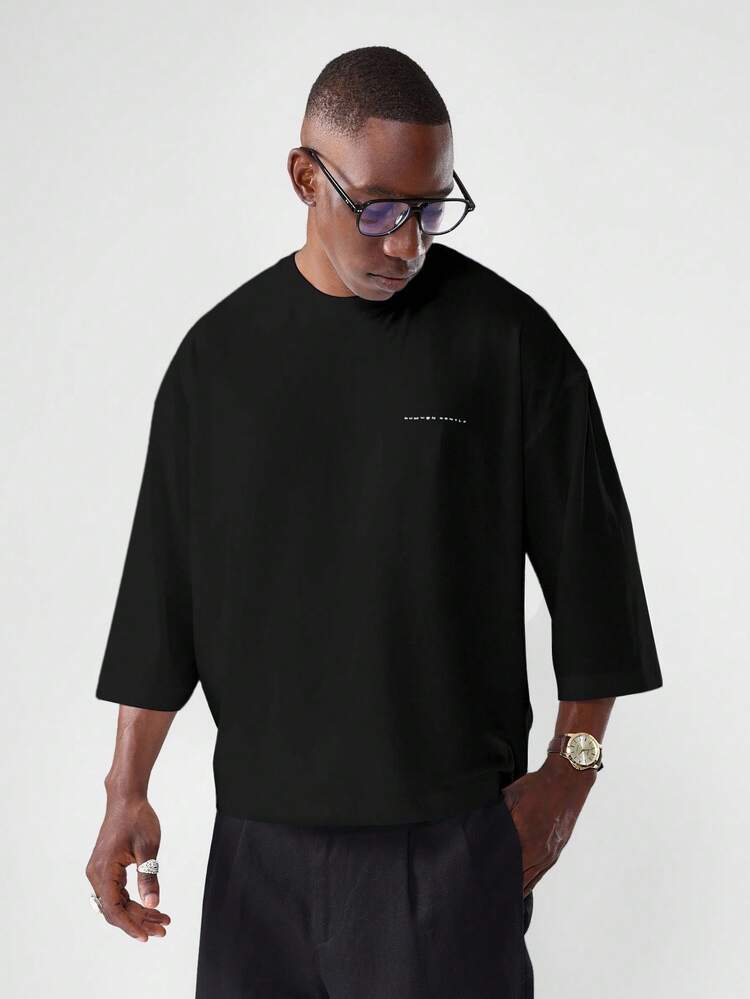 Boxy Fit-Baumwoll-T-Shirt mit Dreiviertelärmeln und minimalistischem Design