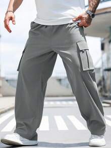 Manfinity Homme Pantalones casuales sueltos con bolsillo de unicolor para hombres talla grande, otoño - Gris Oscuro - Ver 5