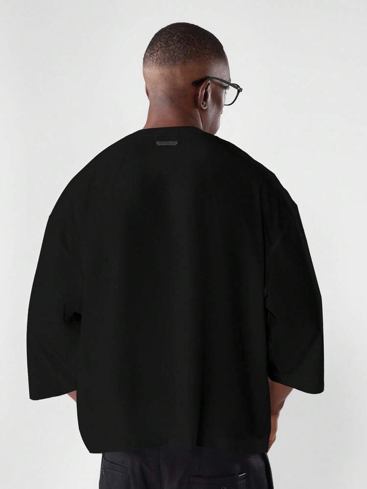 Boxy Fit-Baumwoll-T-Shirt mit Dreiviertelärmeln und minimalistischem Design