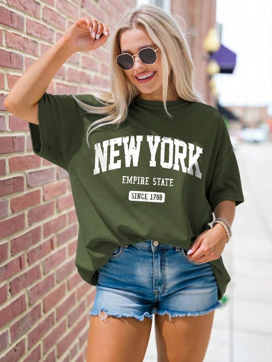 EMERY ROSE Plus Size Women's Casual New York Letter Print Loose Fit Mid-Length Short Sleeve Round Neck T-Shirt - Army Green - View 1