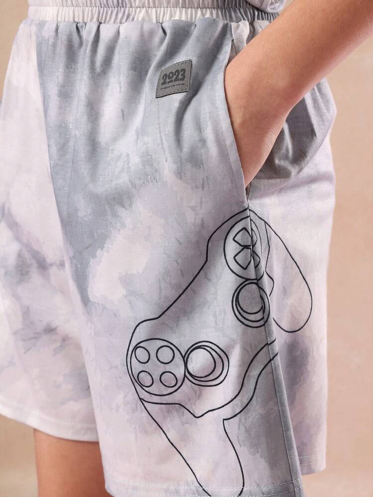 Pigiama tie-dye con controller da gioco