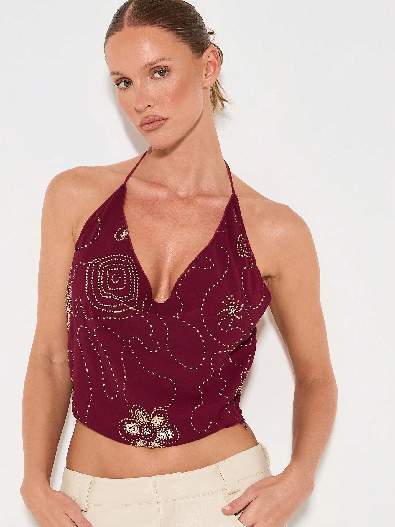 KIZN Camiseta sin mangas con cuello halter y adornos