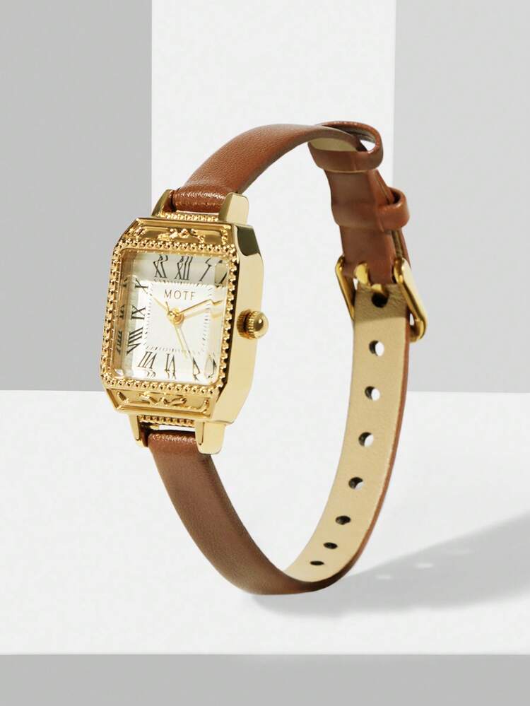 MONTRE FEMME À CHIFFRES ROMAINS DORÉS GRAVÉS