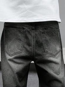 Manfinity EMRG 男士休闲做旧宽松斜口袋牛仔裤，秋季