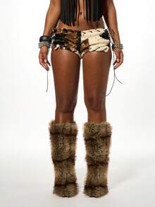 SUMWON WOMEN Halloween Cow Print Faux Fur Booty Shorts With Black Leather Fringe Details Festival Party Micro Shorts