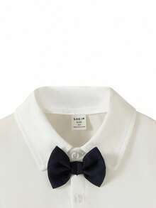 4-Piece Toddler Boys Gentleman Outfit Set: Navy Blue Collar Lapel Long Sleeve Suit Jacket, White Long Sleeve Collared Shirt With Navy Blue Bowknot, Navy Blue Waistcoat, And Formal Suit Pants. Perfect For Birthday Parties, Formal Events, Weddings, Christenings, Baptisms, And Anniversaries. Fall Winter