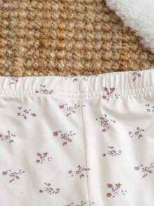 SHEIN Conjunto de 2 piezas de top de manga larga con flores y pantalones para bebé/niño pequeño con cuello con volantes