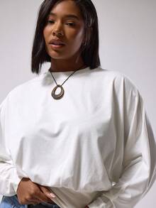 MUSERA Top en jersey à manches longues, taille cintrée, manches bouffantes, coupe courte, grande taille. Style de rue mignon pour tous les jours, fêtes, vacances et soirées - Blanc - Voir 2