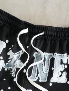 Manfinity EMRG Men's Letter Print Round Neck Short Sleeve T-Shirt And Drawstring Waist Flared Pants Casual Suit