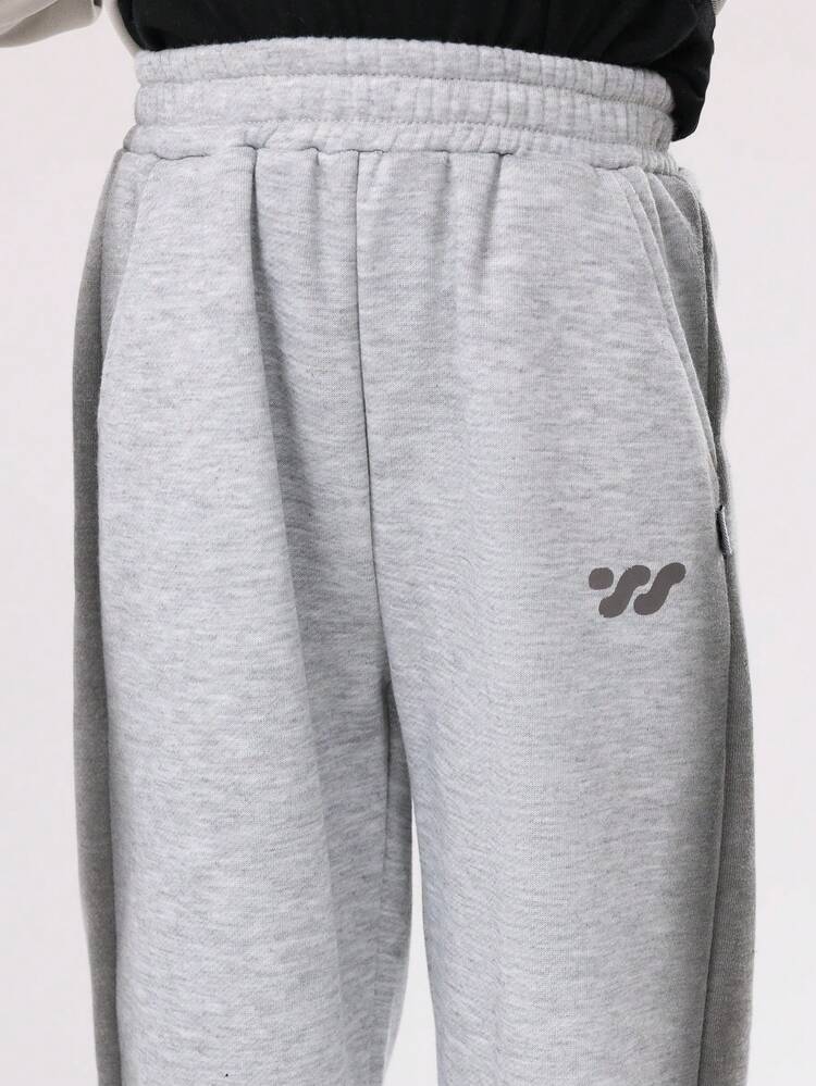 Wide Leg Sweatpants With Side Pockets And Elastic Waist