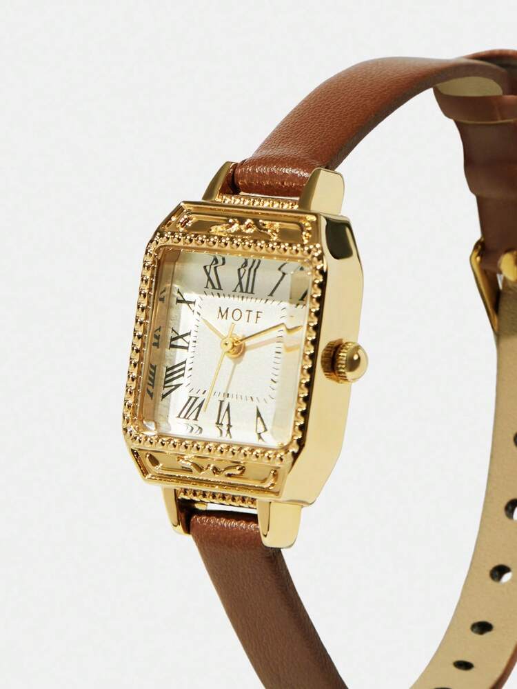 MONTRE FEMME À CHIFFRES ROMAINS DORÉS GRAVÉS