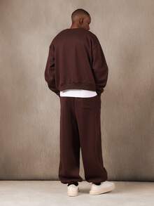 Bộ đồ thể thao SUMWON gồm áo nỉ dáng rộng và quần jogger ống rộng, màu trơn. - Rỉ Nâu - Xem 2