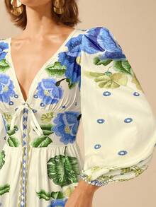 CAJUNI Damen Boho Tropical Blumen V-Ausschnitt Langarm Rückenfreies Taille A-Linie Urlaubskleid