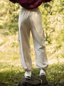 Hanevo Pantalones casuales y deportivos para mujer con cintura elástica y bajo ajustable, pantalones cortavientos - Caqui - Ver 2