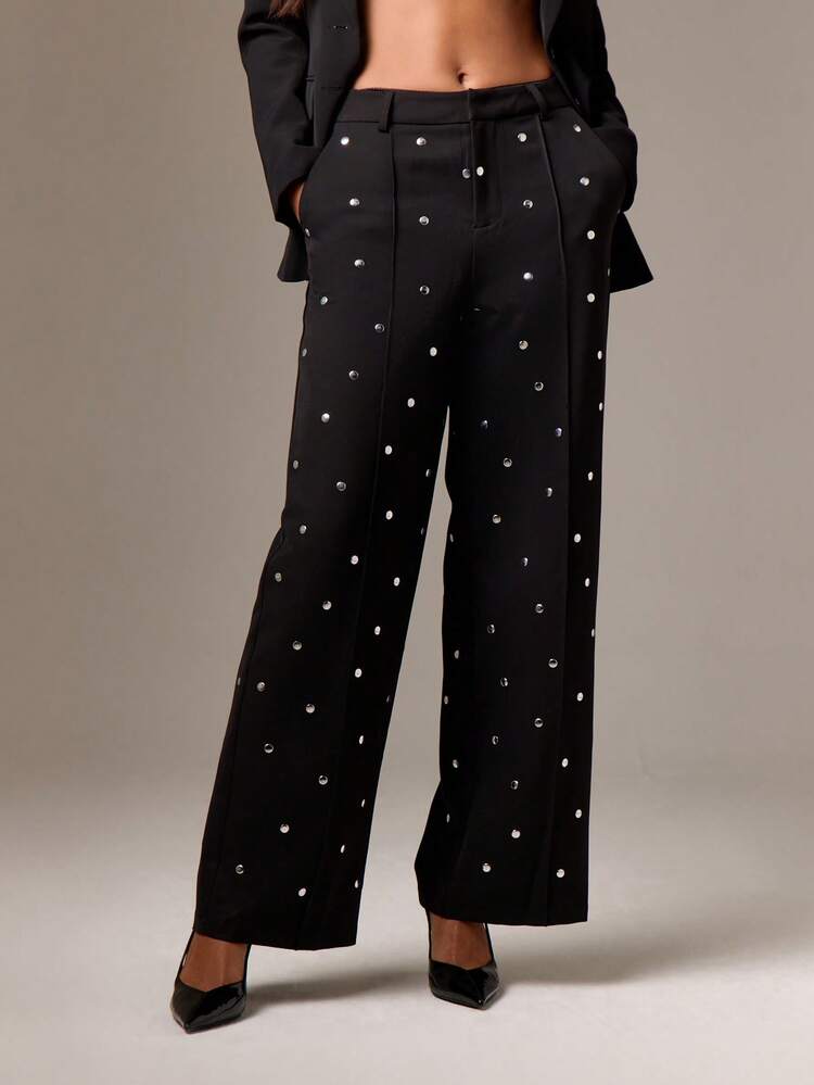 Spodnie z wysokim stanem i szerokimi nogawkami, naszywane ćwiekami