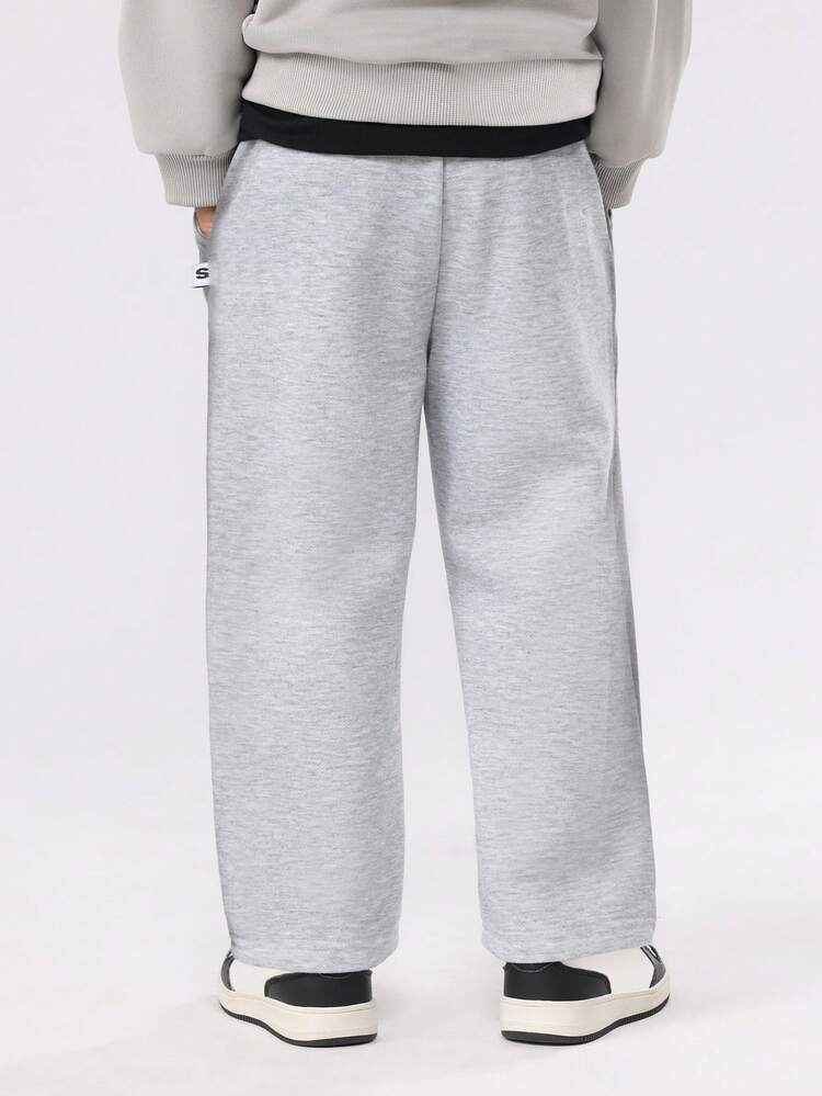 Wide Leg Sweatpants With Side Pockets And Elastic Waist
