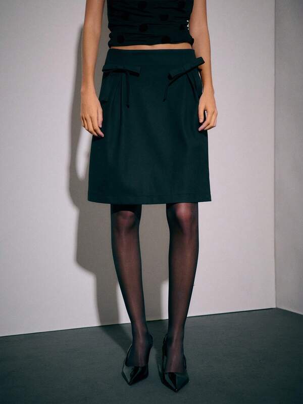 Nöista 女士简约甜美黑色高腰半身裙，完美应对秋季的气温波动