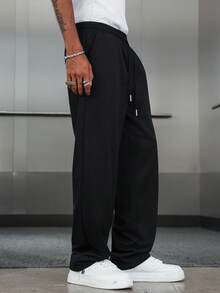 Manfinity EMRG 男士街头风运动裤，INS高街嘻哈黑色刺绣字母休闲宽松直筒运动裤，适合四季日常搭配，送男友/老公礼物，街头潮流 - 黑色 - 查看 3