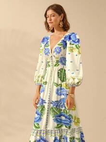 CAJUNI Damen Boho Tropical Blumen V-Ausschnitt Langarm Rückenfreies Taille A-Linie Urlaubskleid