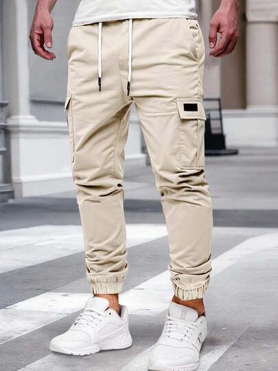 Manfinity Homme Pantalones cargo de moda casual para hombre con bolsillo con solapa y cordón en la cintura, para otoño