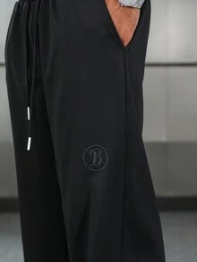 Manfinity EMRG 男士街头风运动裤，INS高街嘻哈黑色刺绣字母休闲宽松直筒运动裤，适合四季日常搭配，送男友/老公礼物，街头潮流 - 黑色 - 查看 2