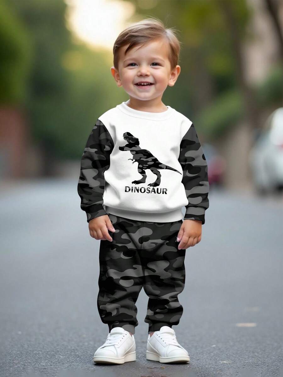 SHEIN 2pcs/Set Baju Olahraga Anak Laki-laki Longgar Motif Dinosaurus dan Kamuflase, Kaos dan Celana Panjang, Set Pakaian Olahraga Kasual Nyaman, Musim Panas - MultiWarna - View 1