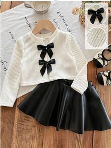 LMoss Kids LMoss 女婴两件套，包括一件纯色针织圆领T恤和一条PU皮裙。女婴两件套，女童两件套服装，女婴蝴蝶结套装，两件套女婴服装，女婴两件套，秋季服装，秋季套装，女婴秋季服装，秋季套装，女婴冬季秋季服装。