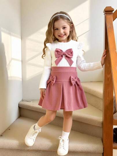 Elladie kids 4-7 岁女童休闲甜美白色针织提花蝴蝶结装饰荷叶边长袖圆领上衣和粉色灯芯绒松紧腰百褶裙，适合日常穿着、休闲外出