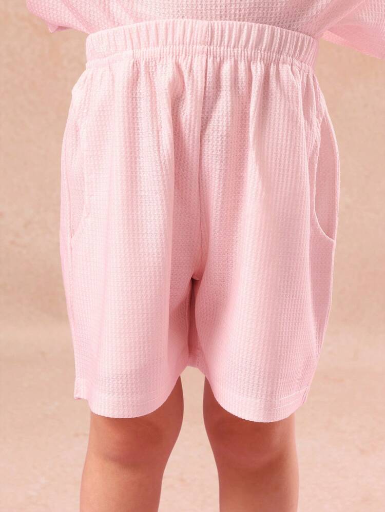 Completo da notte con top stampato con lettere e pantaloncini coordinati