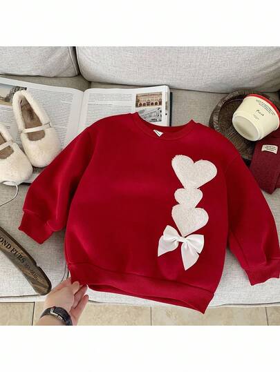 秋冬少女纯色心形图案宽松圆领休闲卫衣