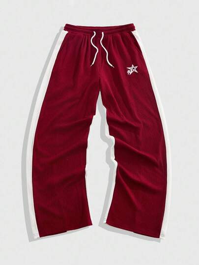 Street Life Pantalones de chándal con cordón en la cintura, parches de color contrastante y bordado de estrella para hombres