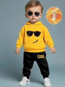 2pcs/Set Baby Boy Fashion Funny Expression & Sunglasses Print Hoodie Sweatshirt And Letter Print Fleece Sweatpants Outfit, Suitable For Outings In Autumn/Winter, Yellow Hoodie And Black Pants Set - Multicolor - View 1