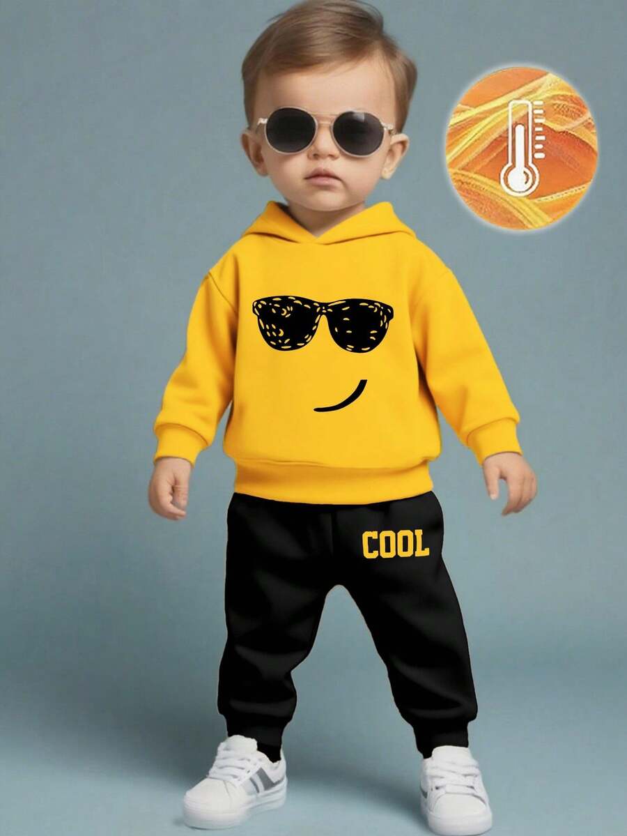 2pcs/Set Baby Boy Fashion Funny Expression & Sunglasses Print Hoodie Sweatshirt And Letter Print Fleece Sweatpants Outfit, Suitable For Outings In Autumn/Winter, Yellow Hoodie And Black Pants Set - Multicolor - View 1
