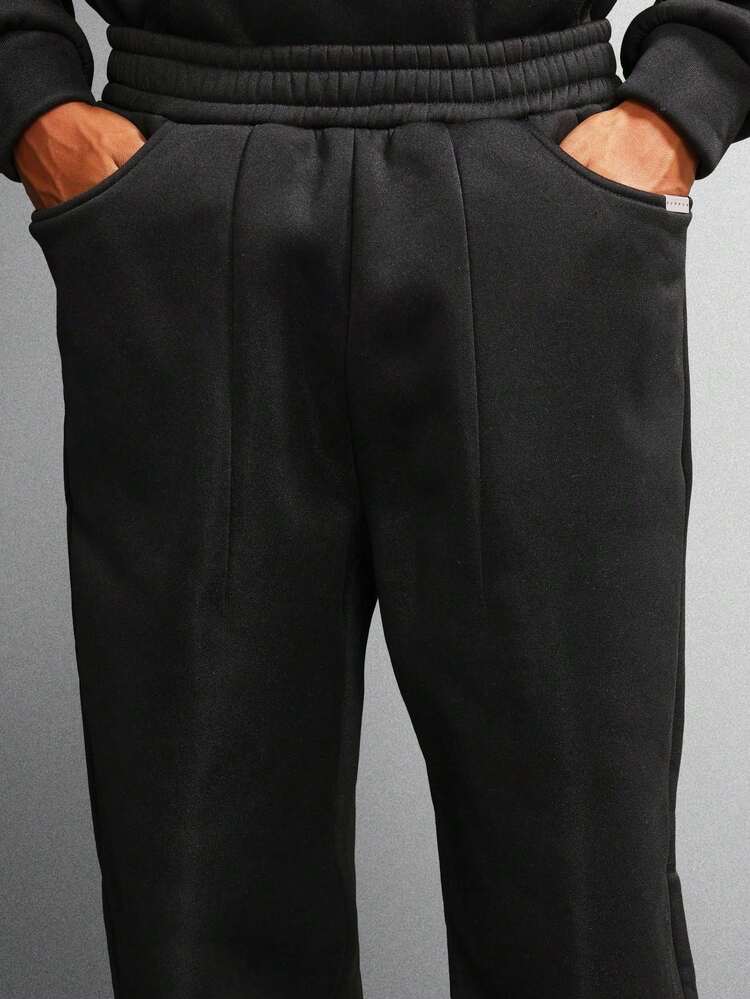 Pull à capuche avec cordon de serrage et pantalon de jogging assorti