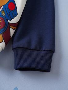 SHEIN | PAW Patrol Bluza z kapturem dla chłopca z nadrukiem uroczego psa w blokach kolorów, odpowiednia na jesień/zimę i do uprawiania sportów na świeżym powietrzu