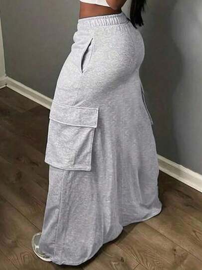 Slaydiva Falda larga recta gris de trabajo de verano casual de cintura alta con bolsillos, con estampado de flores ligero que cubre las caderas para mujeres