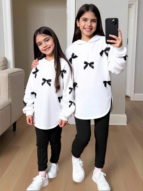 SHEIN Tween Girls Casual Hooded Loose Drop Shoulder Colorblock Ribbon Bow Decor Asymmetric Hem Sweatshirt And Black Leggings Sports Suit, Black & White Fall Winter