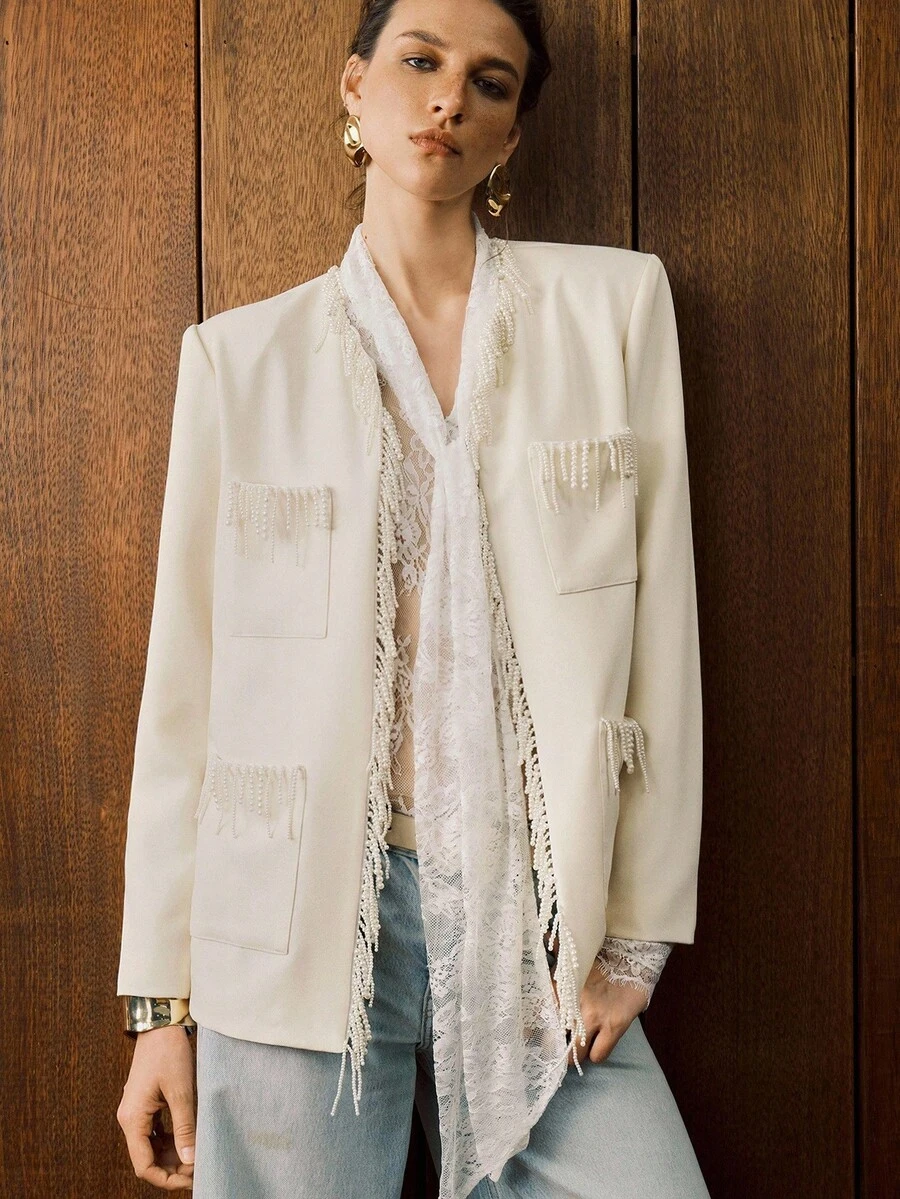 Arave Chaqueta elegante de mujer con perlas color albaricoque y flecos ...