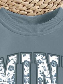 SHEIN Playful Pals Sweatshirt für Kleinkind Mädchen, lässige Mode mit kreativer Schleife, Blumen-Grafik, Slogan-Aufdruck, Rundhalsausschnitt, Herbstoutfit