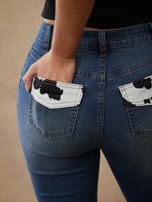 WESTFADE جينز دينم ذو خصر مرتفع وقصة ضيقة وواسعة في الأسفل مع جيب خلفي بطبعة بقرة، مناسب لحفلات الموسيقى الريفية