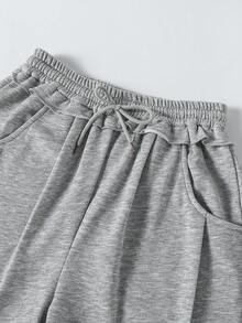 Sparklyn 一套青少年女孩时尚宽松舒适灰色卫衣裤套装，毛边下摆设计，喇叭裤腿，适合休闲、旅行、聚会、运动、上学、通勤等多种场合，适合春、秋、冬三季穿着。