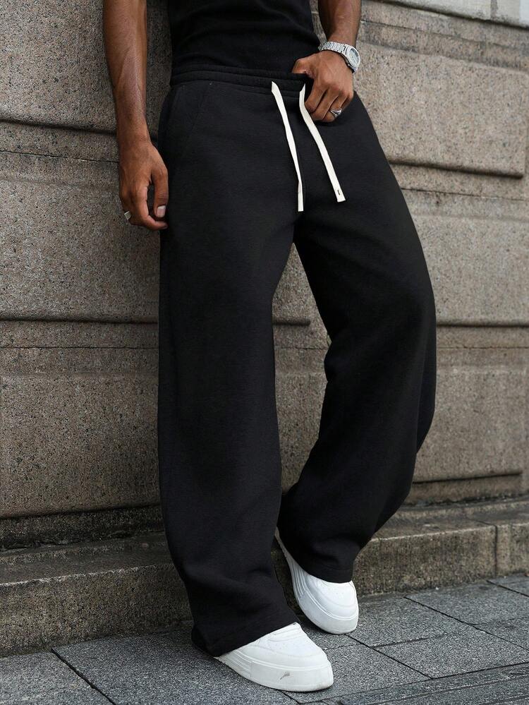 Manfinity Hypemode Pantalones de chándal holgados y casuales para hombres, adecuados para el uso diario casual, salidas de fin de semana, reuniones con amigos, viajes y otras actividades sociales relajadas. Este pantalón es una pieza versátil e indispensable en el guardarropa de un hombre, y hace un gran regalo para novios o esposos. - Negro - Añade 8