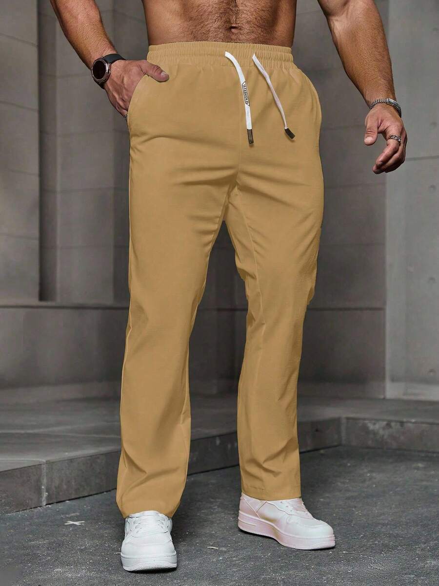 Manfinity LEGND Men's Plain Drawstring With Pocket Casual Pants, Men Drawstring Pants, Men Wide Leg Side Stripe Gym Pants, Men Straight Leg Sweatpants, Men Pants Summer, For Fall - Khaki - View 1