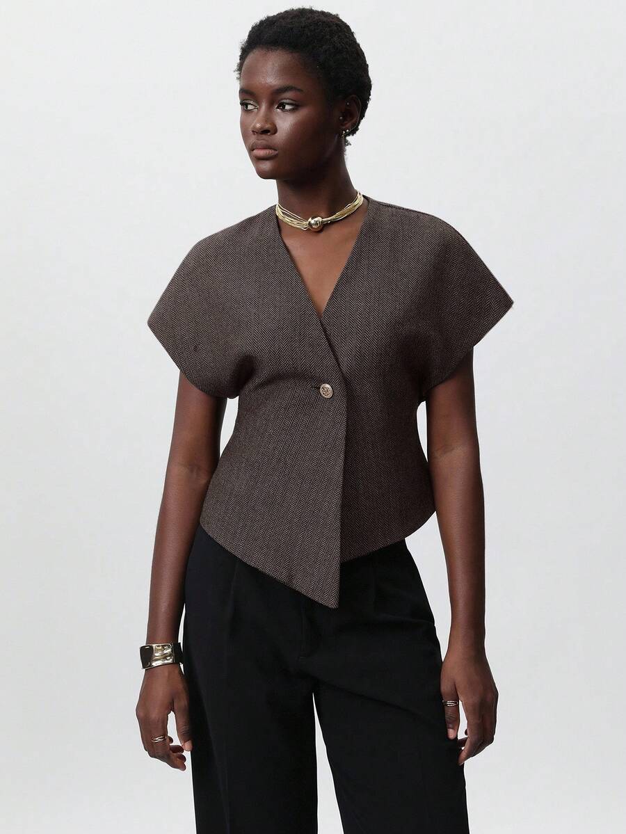 Aveloria Modichic Blusa minimalista deconstruida de talla grande con cuello en V y un solo botón, diseño de bajo asimétrico, sin mangas, adecuada para el trabajo, verano - Albaricoque - Ver 1