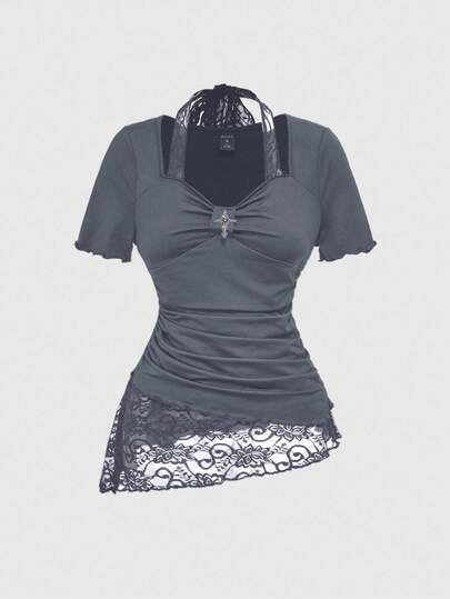 Maglietta da donna con scollo alla halter, vita con laccio, orlo asimmetrico e inserti in pizzo