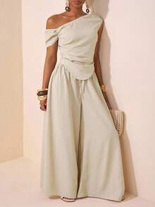 Veslaya 春夏初秋新款圣帕特里克节、生日派对、毕业季、教师节服装、日常休闲穿搭、度假、邮轮旅行、海滩、日光浴、时尚、通勤、早午餐、机场穿搭，女士大码不对称肩部设计褶皱下摆露脐上衣和阔腿裤两件套，纹理面料 - 杏色 - 查看 6