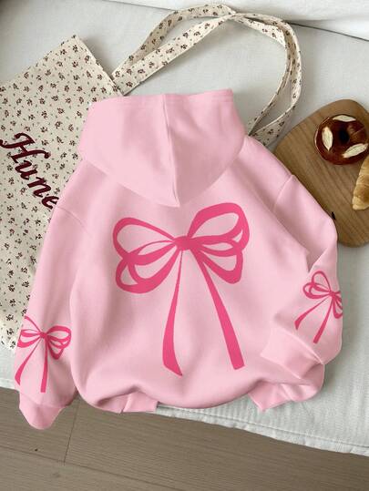 休闲可爱蝴蝶结装饰宽松卫衣，适合青少年女孩，奶油粉色，舒适透气，适合秋冬季节穿着。