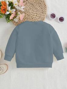 SHEIN Playful Pals Sweatshirt für Kleinkind Mädchen, lässige Mode mit kreativer Schleife, Blumen-Grafik, Slogan-Aufdruck, Rundhalsausschnitt, Herbstoutfit