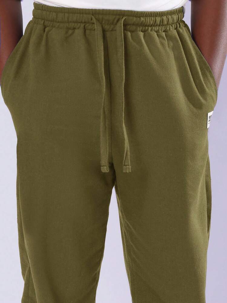 사이드 포켓과 드로스트링이 있는 스트레이트 레그 조거 팬츠